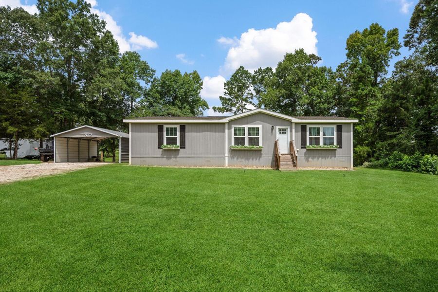 Exterior details and patio area of a home in , Livingston (Image 19). Exterior details and patio area of a home in , Livingston (Image 19).