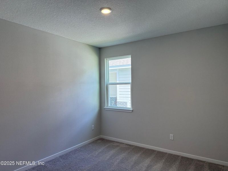 Spacious, unfurnished interior of a new home in The Preserve at Concourse Crossing, Fernandina Beach (Image 14).