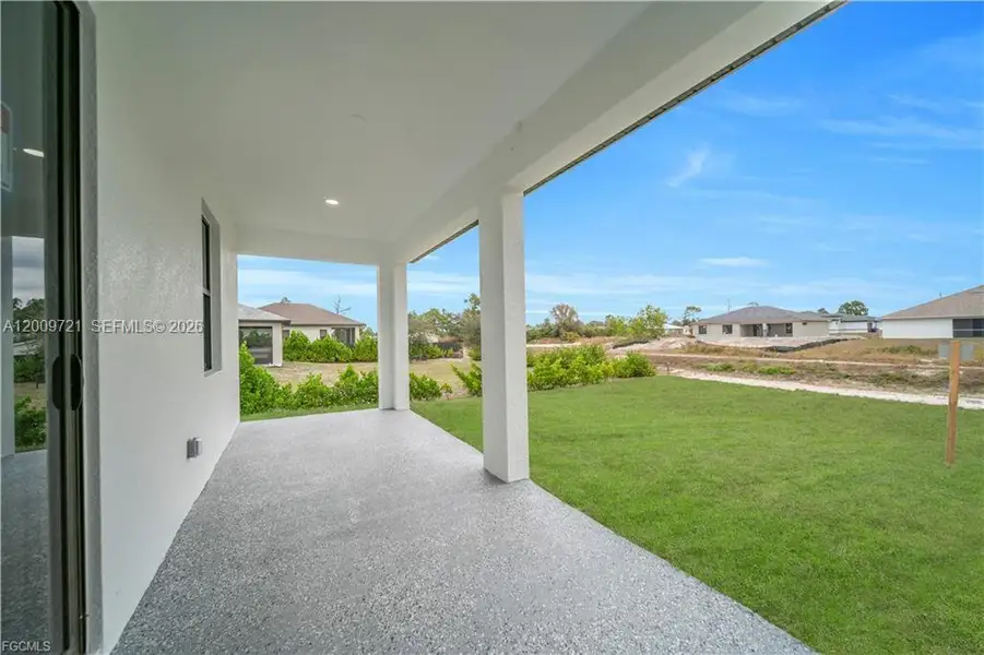 Exterior details and patio area of a home in , Lehigh Acres (Image 4).