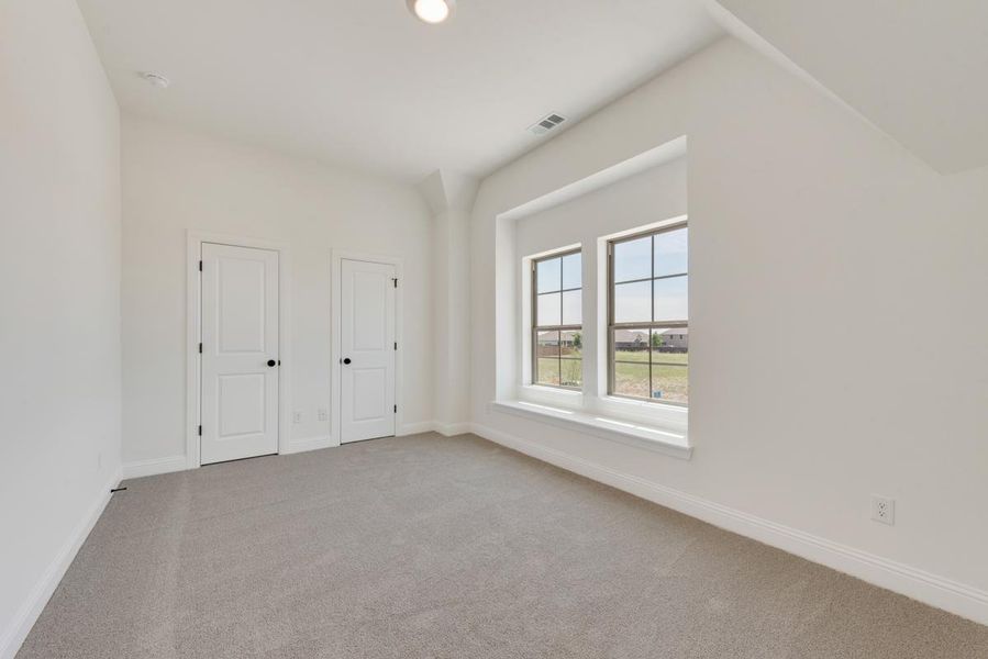 Representative unfurnished interior of a home built from the Grand Silverwood by Grand Homes in Edgewater, Fate (Image 28). Representative unfurnished interior of a home built from the Grand Silverwood by Grand Homes in Edgewater, Fate (Image 28).