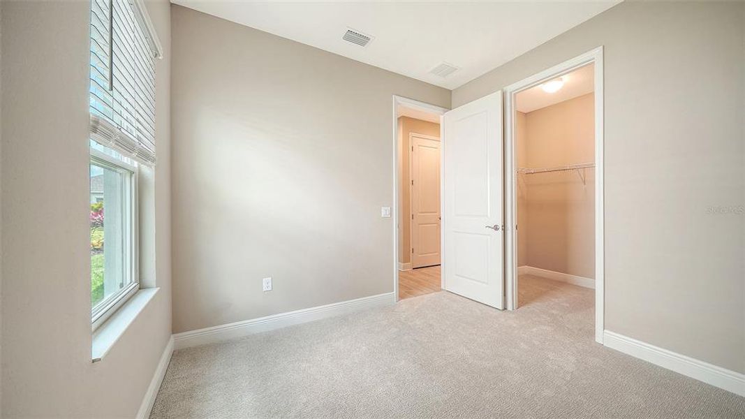 Spacious, unfurnished interior of a new home in Wildleaf at North River Ranch, Parrish (Image 34).