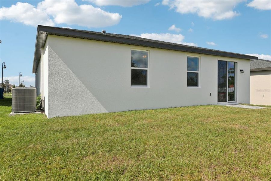Exterior details and patio area of a home in Crosswinds - Signature Series, Haines City (Image 22).