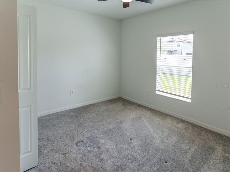 Spacious, unfurnished interior of a new home in The Isle of Avalon, Spring Hill (Image 15).