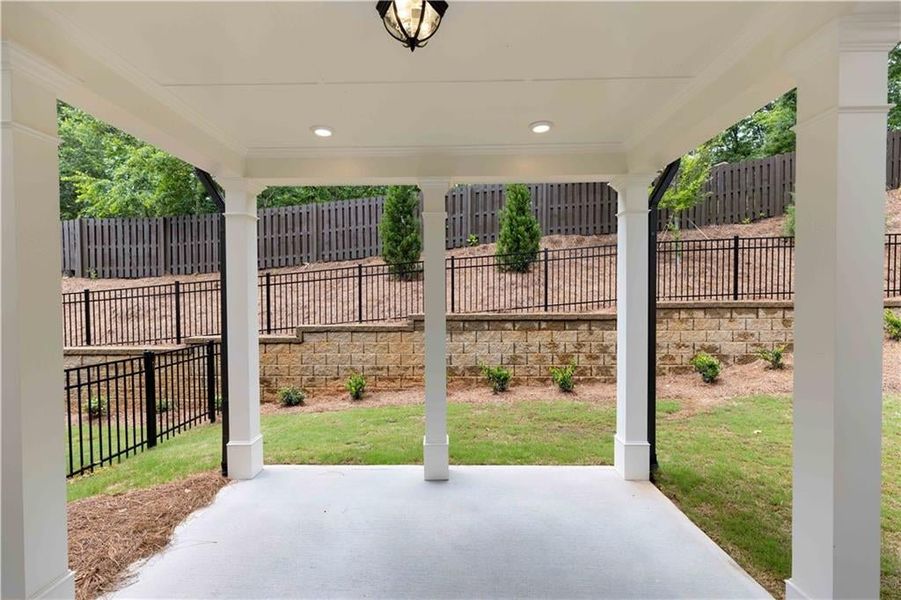 Covered patio leading from your sliding doors onto your backyard -Pictures are for illustration purposes only, not the actual home since it is under construction.*