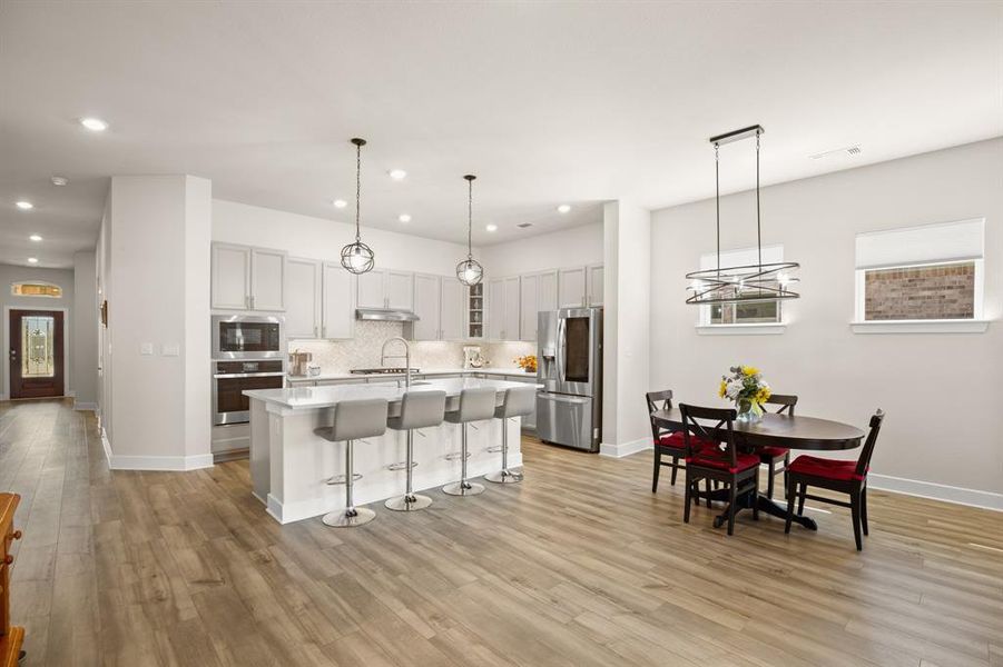 Enjoy the open floorplan design, seamlessly connecting the living room, kitchen, and dining area, perfect for entertaining and everyday living.