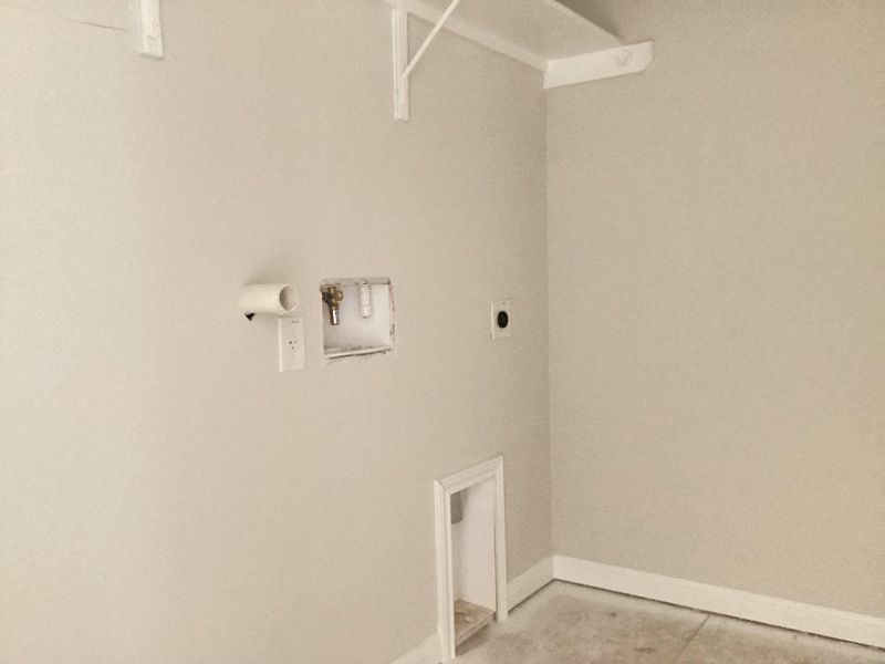 In-progress construction of a new home in The Cottages at Lariat, Liberty Hill, TX (Image 29).