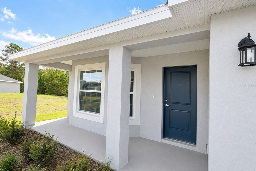 Exterior details and patio area of a home in Harmony Central, St. Cloud (Image 3).
