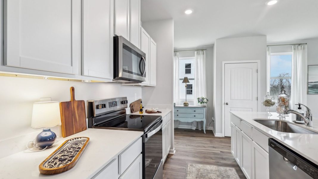 Representative furnished interior of a home built from the ELSTON by D.R. Horton in River Landing, Murfreesboro (Image 19).
