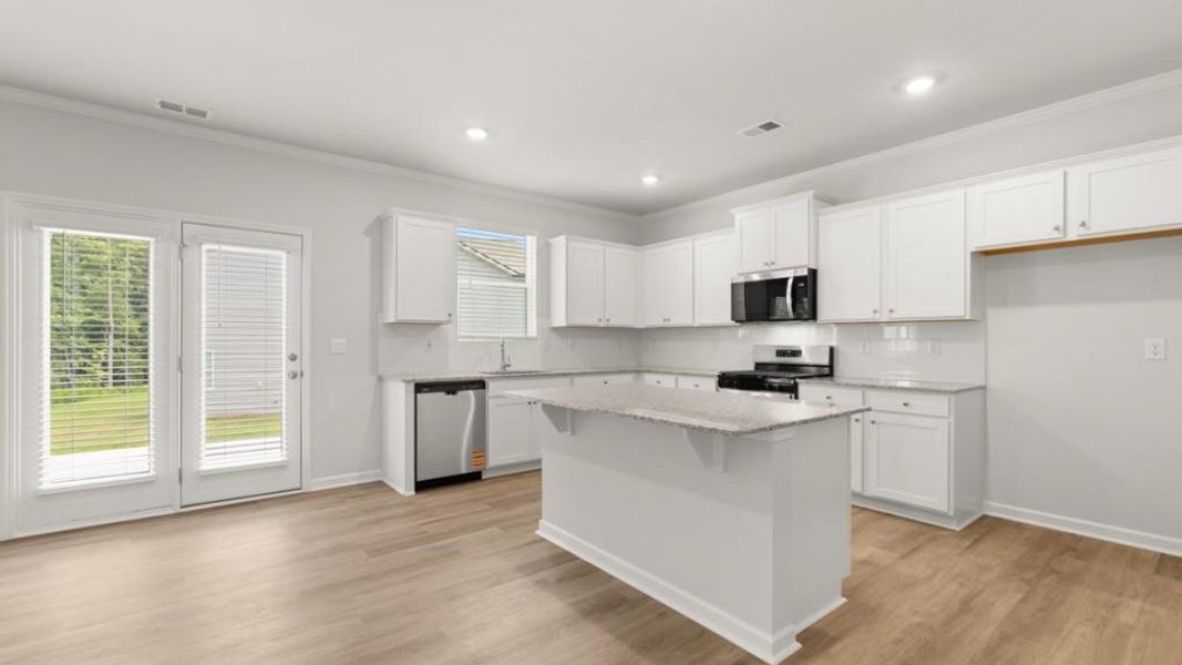 Furnished interior view inside a new home in Northwoods at Mirror Lake, Villa Rica (Image 12).