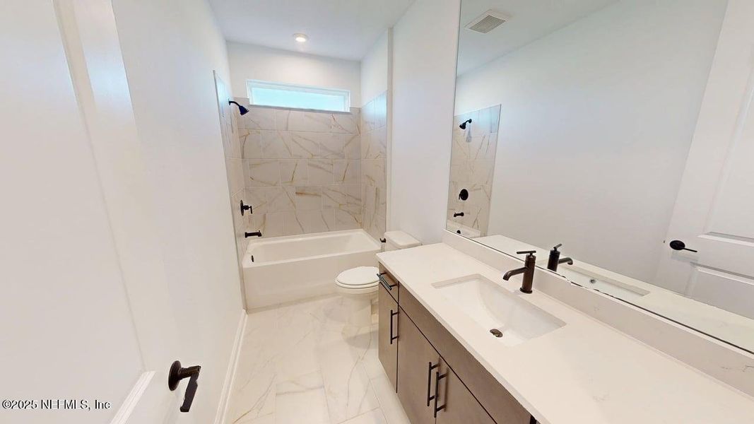 Furnished interior view inside a new home in RiverTown - WaterSong, St. Johns (Image 10).