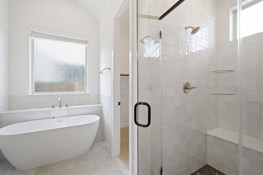 Freestanding soaking tub with deck-mounted faucet
