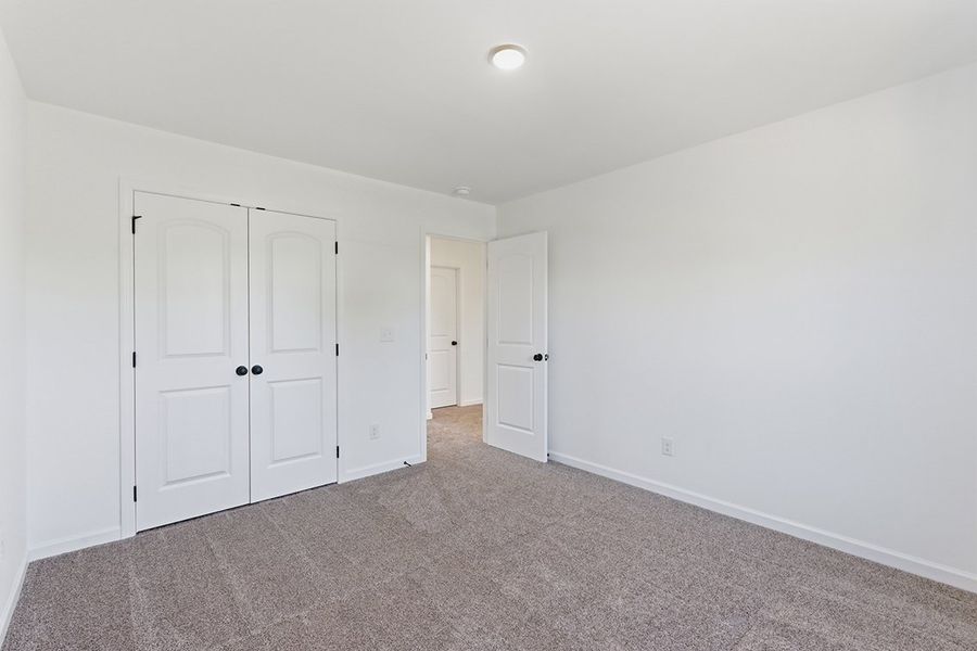 A room with white doors.