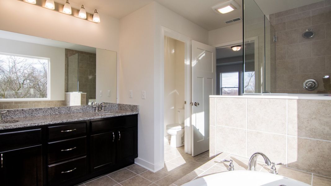 Representative furnished interior of a home built from the The Hartland by Norfolk Homes in Coronado Estates, Jackson (Image 44).