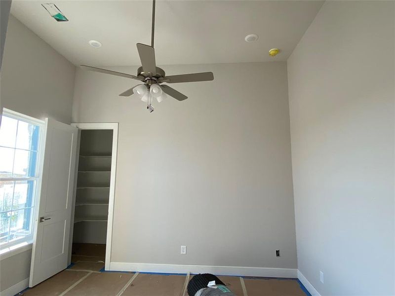 Unfurnished bedroom with a closet and ceiling fan Unfurnished bedroom with a closet and ceiling fan