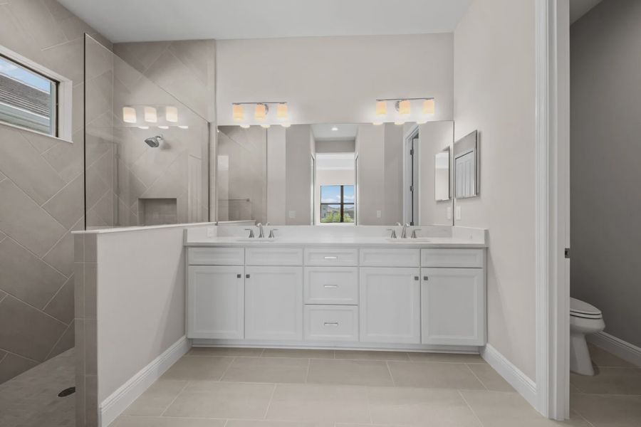 Representative furnished interior of a home built from the Eventide 4 by Neal Communities in SkySail, Naples (Image 6).