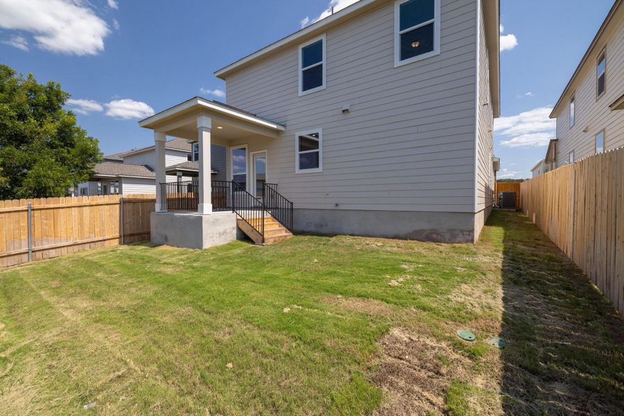 Front exterior of a new home in Sonterra - Cool Water, Jarrell, TX, highlighting curb appeal (Image 22). Front exterior of a new home in Sonterra - Cool Water, Jarrell, TX, highlighting curb appeal (Image 22).