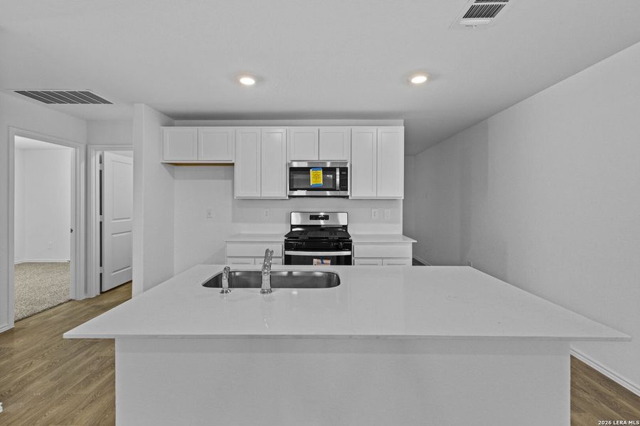 Furnished interior view inside a new home in Hickory Ridge, Elmendorf (Image 11).