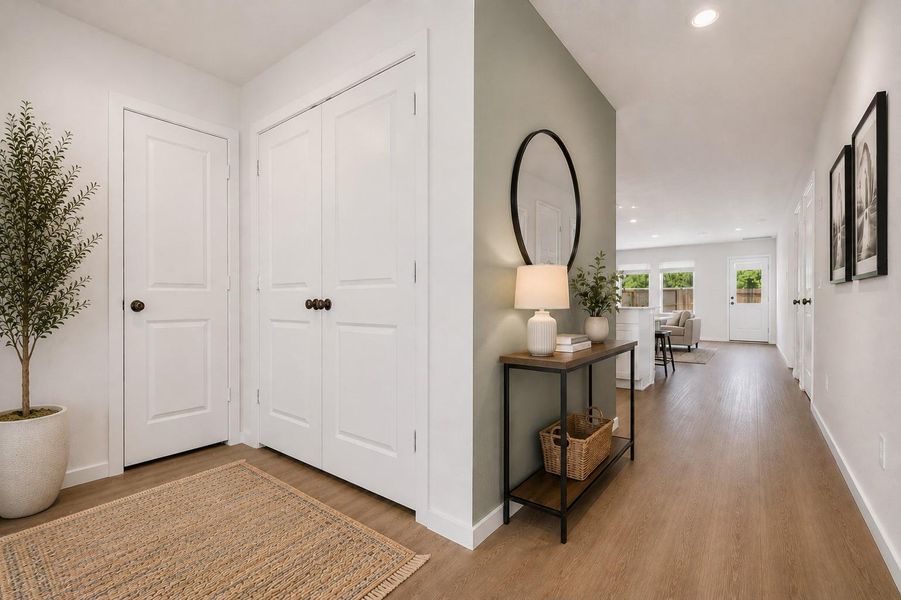 From the entry, the home opens naturally into the spacious living areas.The accent wall is virtually painted and staged.