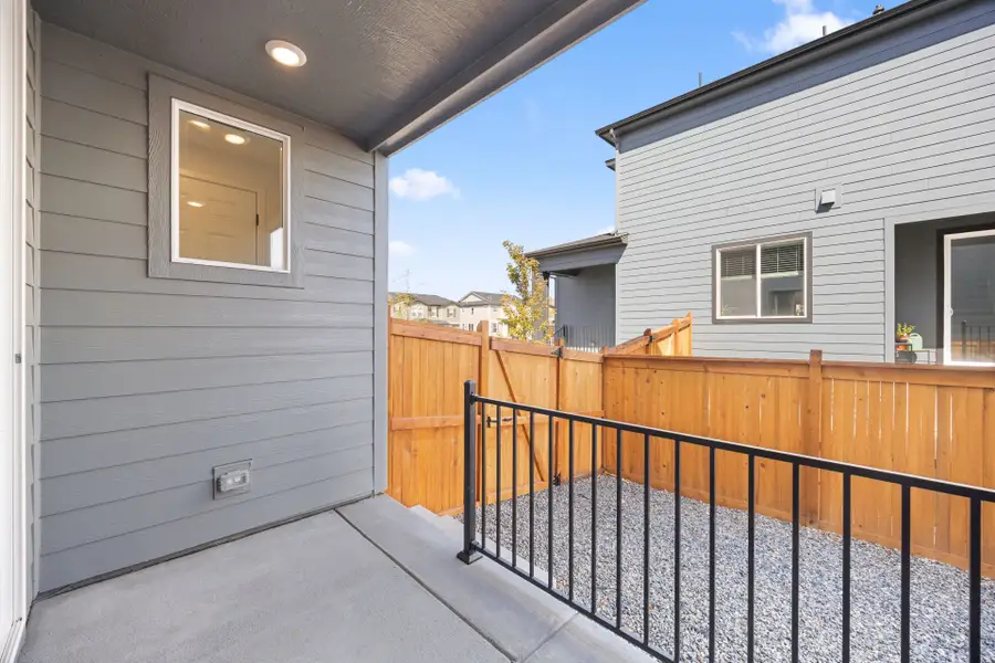 Exterior details and patio area of a home in Sky Ranch, Watkins (Image 3).