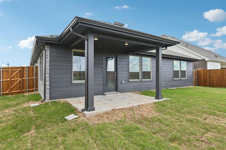 Exterior details and patio area of a home in River Ridge, Crandall (Image 3). Exterior details and patio area of a home in River Ridge, Crandall (Image 3).