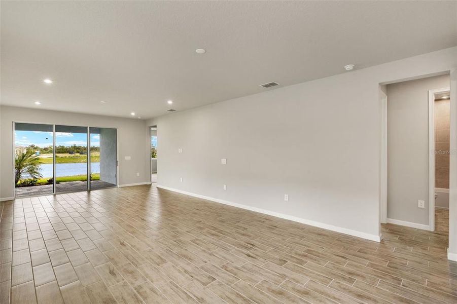 Spacious, unfurnished interior of a new home in Sunstone at Wellen Park, Venice (Image 17).