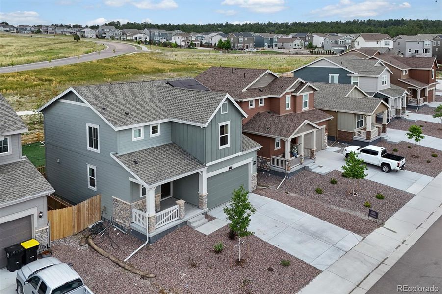 Front exterior of a new home in , Elizabeth, CO, highlighting curb appeal (Image 1).