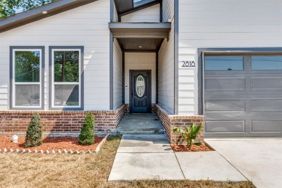 Front exterior of a new home in , Dallas, TX, highlighting curb appeal (Image 1). Front exterior of a new home in , Dallas, TX, highlighting curb appeal (Image 1).