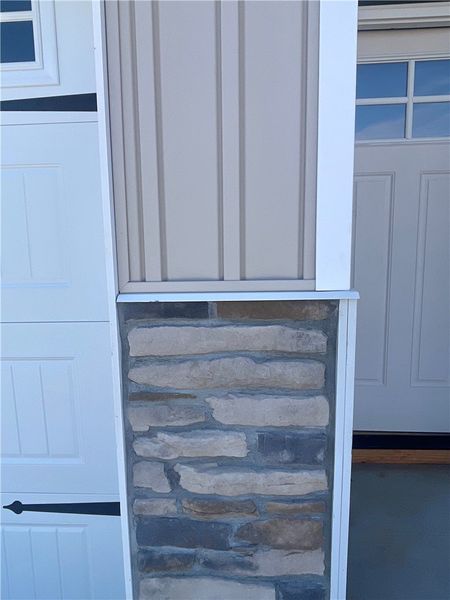 Exterior details and patio area of a home in Springwood Grove, Central (Image 3).