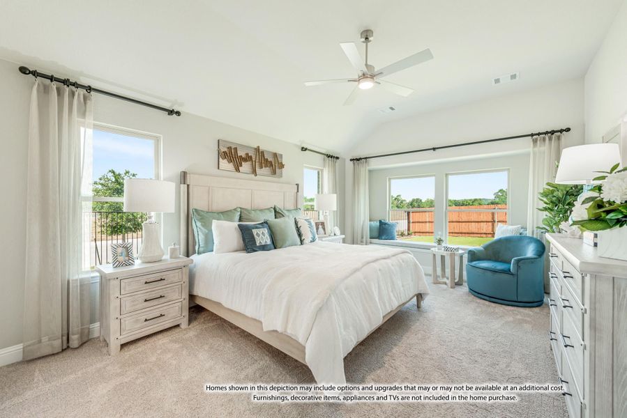 Spacious master bedroom with vaulted ceiling, ceiling fan, carpet floors, and large windows with backyard views. Spacious master bedroom with vaulted ceiling, ceiling fan, carpet floors, and large windows with backyard views.