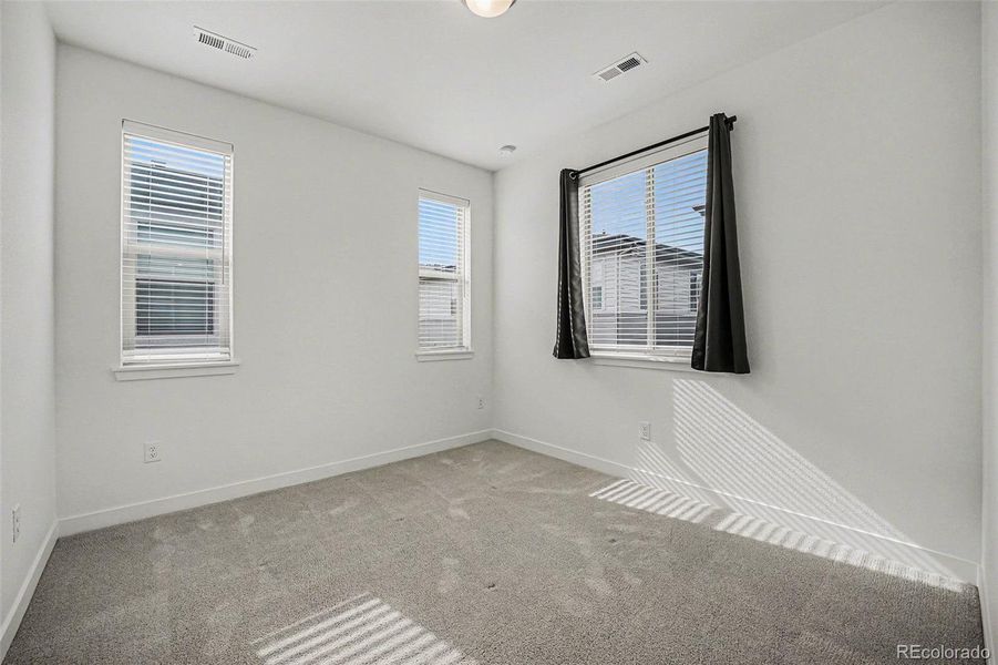 Spacious, unfurnished interior of a new home in Red Rocks Ranch, Morrison (Image 41).