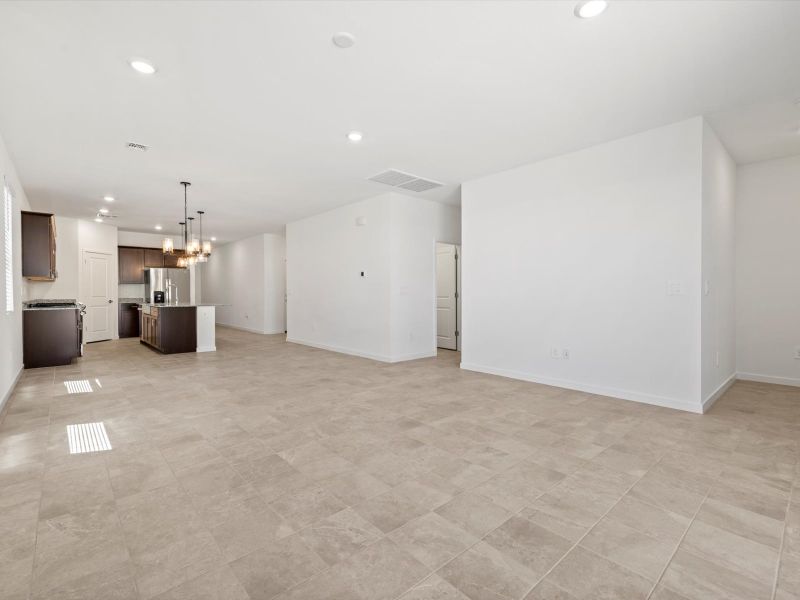 Spacious, unfurnished interior of a new home in Rancho Mirage Estate Series, Maricopa (Image 9).