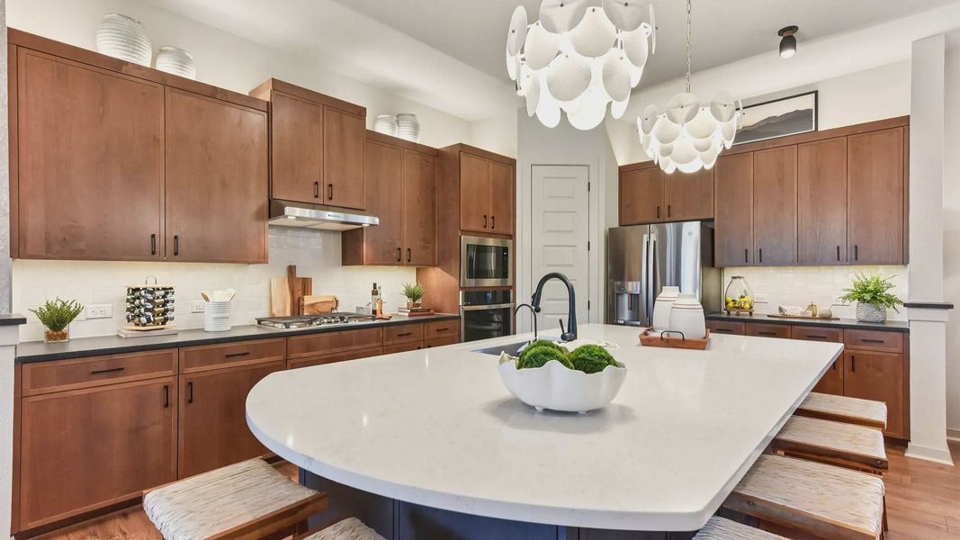 Representative furnished interior of a home built from the Peyton by Chesmar Homes in The Grove at Blackhawk, Pflugerville (Image 15).