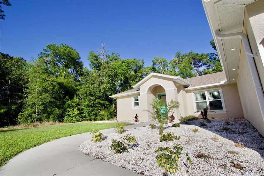 Exterior details and patio area of a home in , Brooksville (Image 23).
