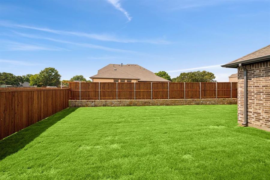 Front exterior of a new home in Sterling Greene, Arlington, TX, highlighting curb appeal (Image 2). Front exterior of a new home in Sterling Greene, Arlington, TX, highlighting curb appeal (Image 2).