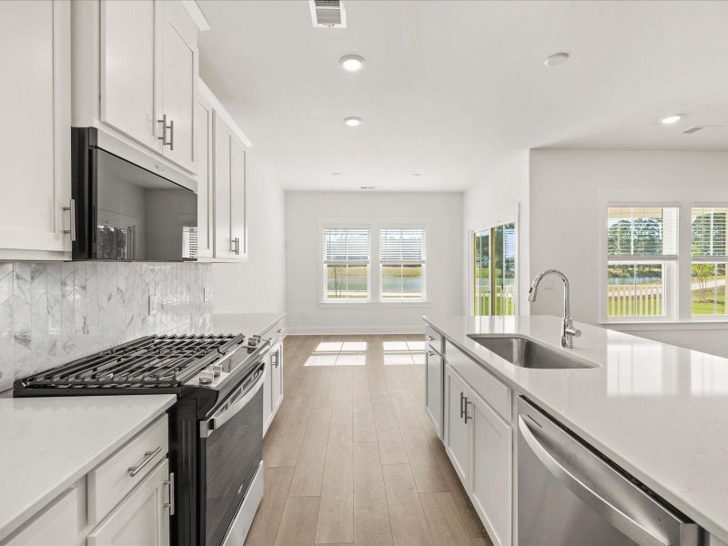 Furnished interior view inside a new home in The Coves at Lakes of Cane Bay II, Summerville (Image 12).