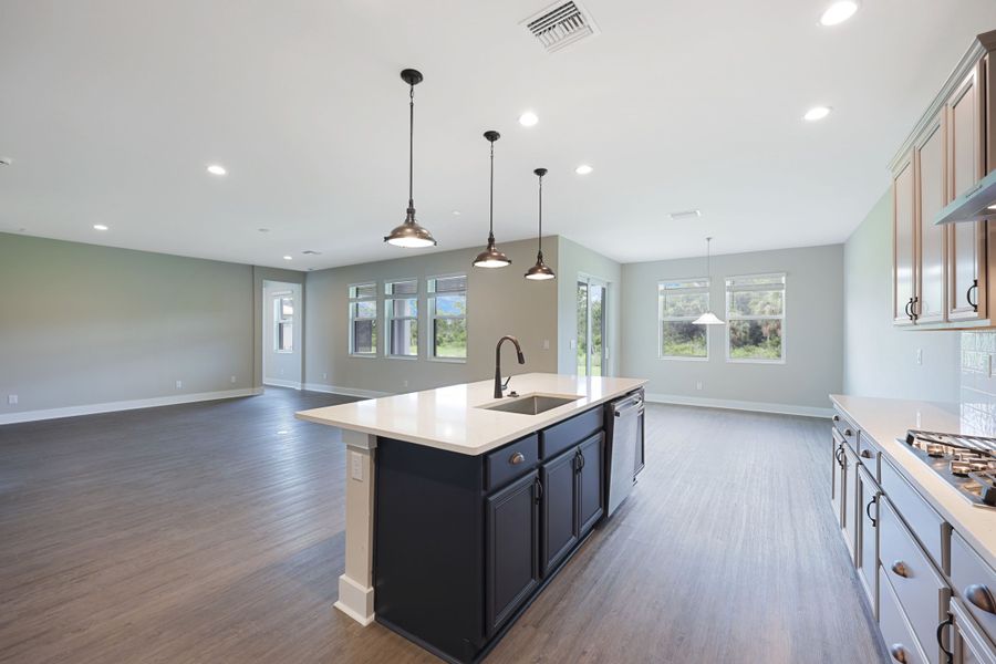 Representative furnished interior of a home built from the Jupiter by William Ryan Homes in The Sanctuary – Royal Collection, Punta Gorda (Image 5).