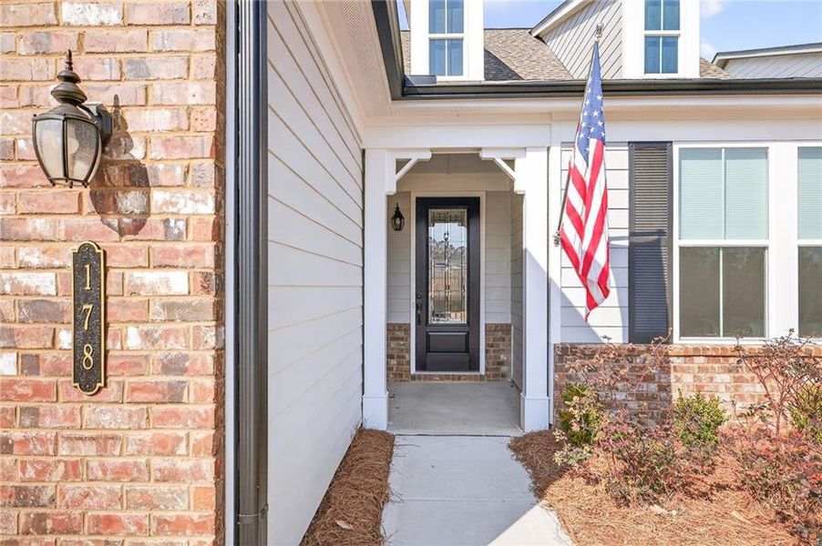 Exterior details and patio area of a home in , Hoschton (Image 24).
