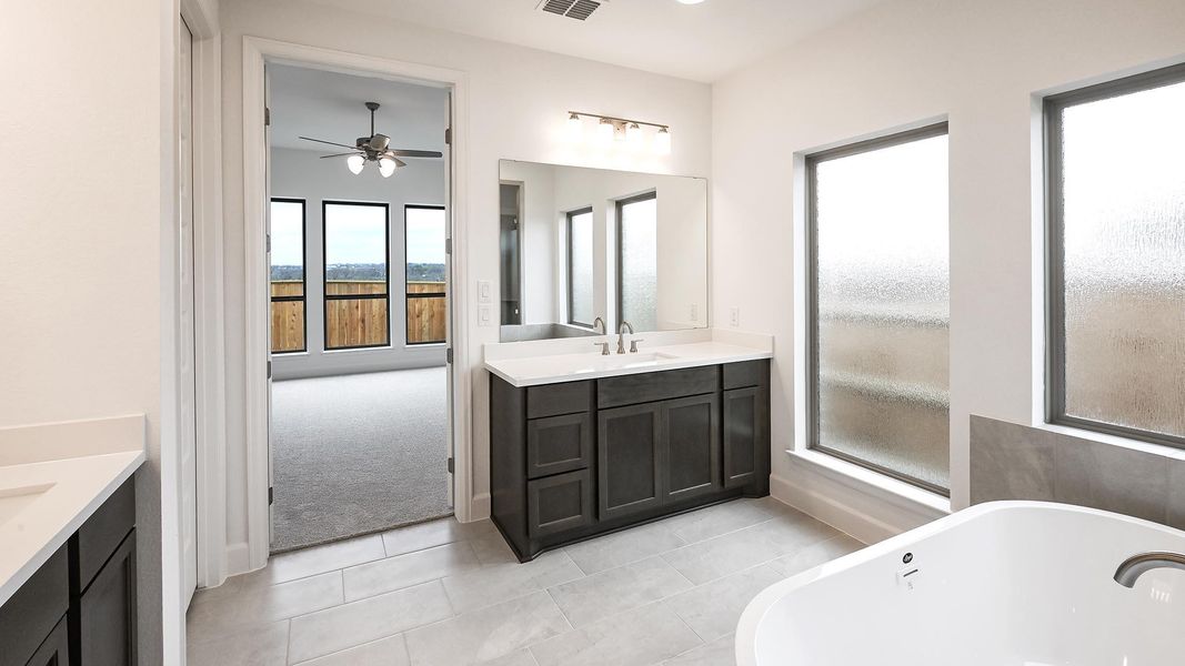 Furnished interior view inside a new home in Crosswinds, Kyle (Image 14).