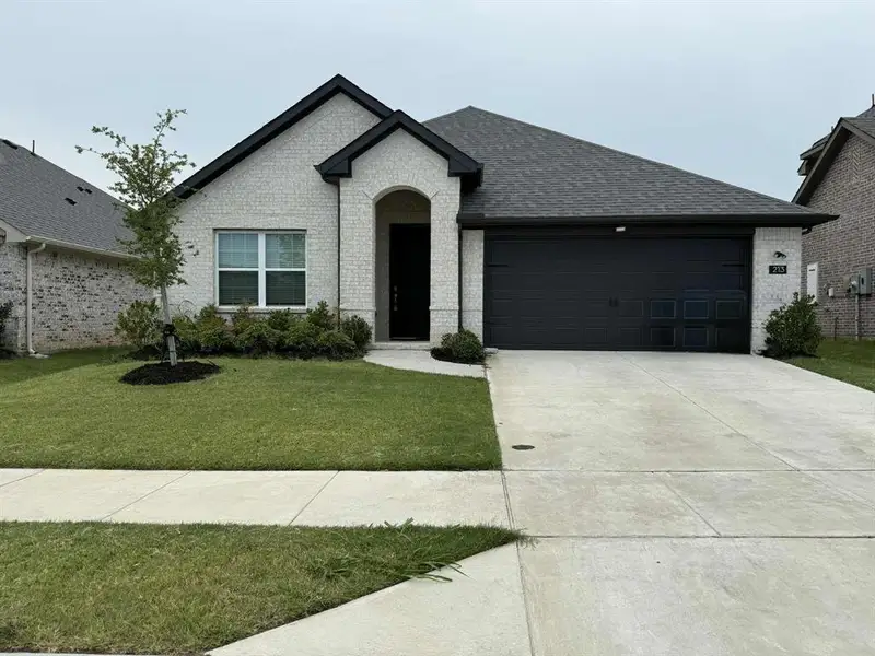 Front exterior of a new home in , Anna, TX, highlighting curb appeal (Image 1).