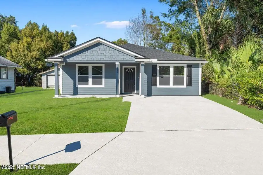 Front exterior of a new home in , Jacksonville, FL, highlighting curb appeal (Image 2).