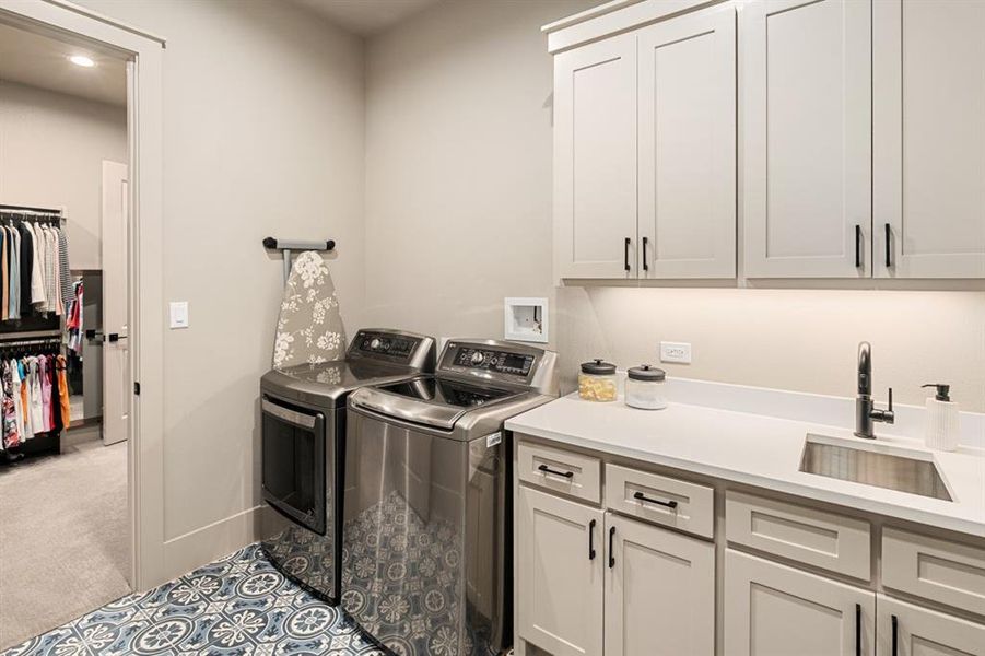 Laundry room off the primary closet, great location Laundry room off the primary closet, great location