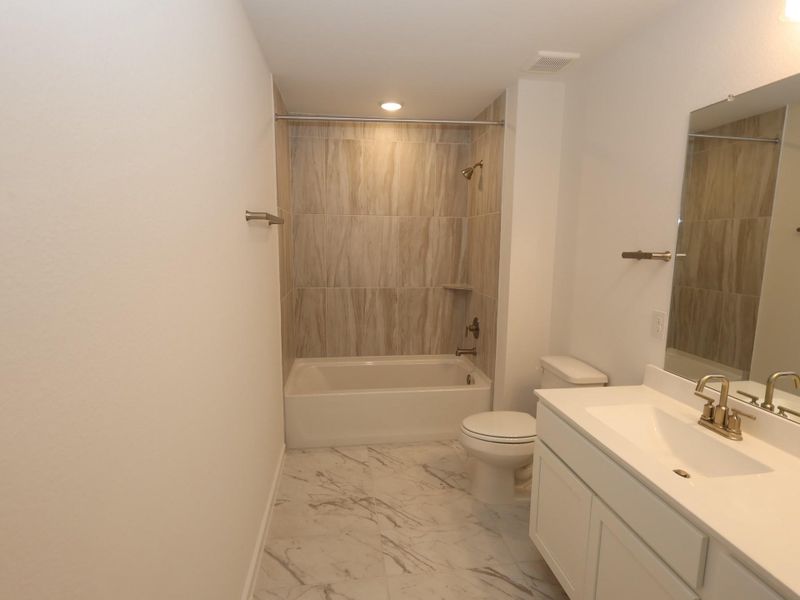 Furnished interior view inside a new home in Marvida, Cypress (Image 10).