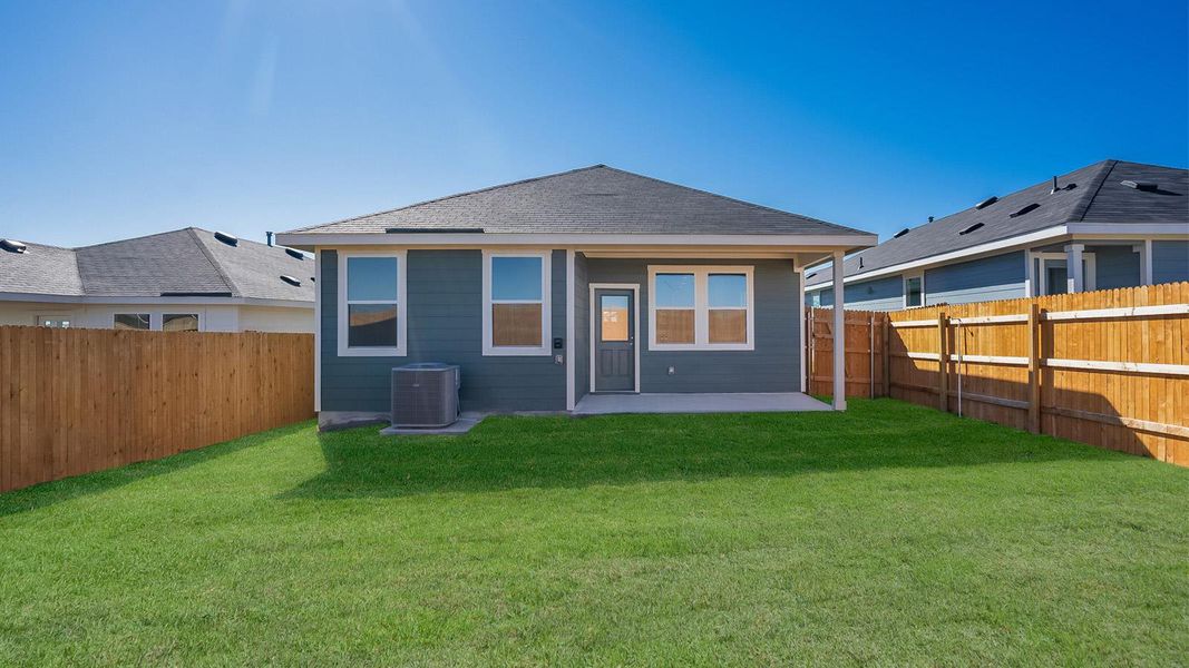 Exterior details and patio area of a home in Marigold, Kyle (Image 4).