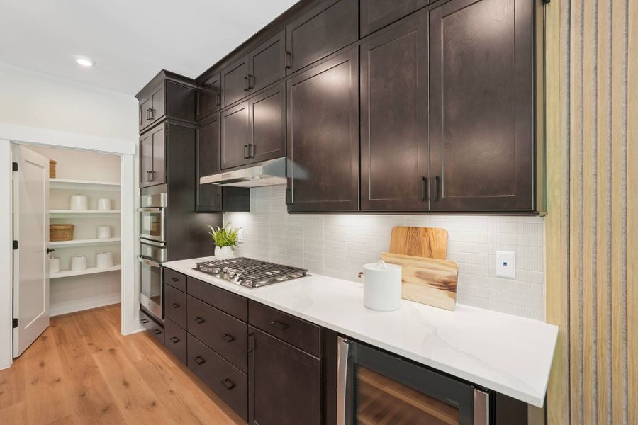 Image 8 representing the Longleaf Way by Tri Pointe Homes in Altis At Serenity, Fuquay Varina, NC.