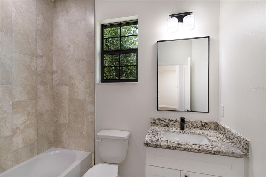 Furnished interior view inside a new home in , Port Charlotte (Image 9).