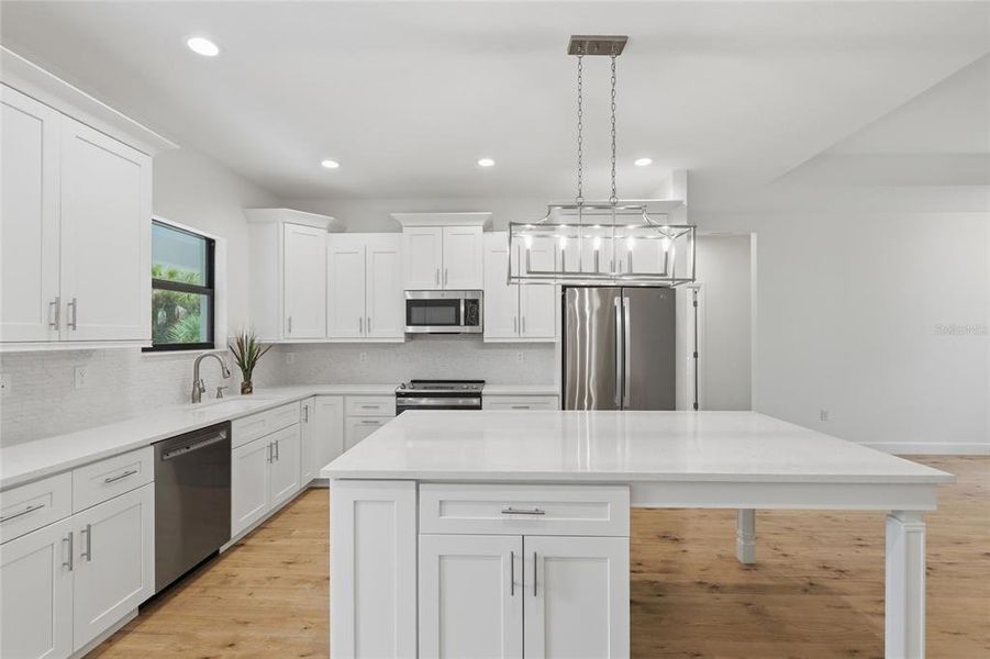 Furnished interior view inside a new home in , Port Charlotte (Image 11).