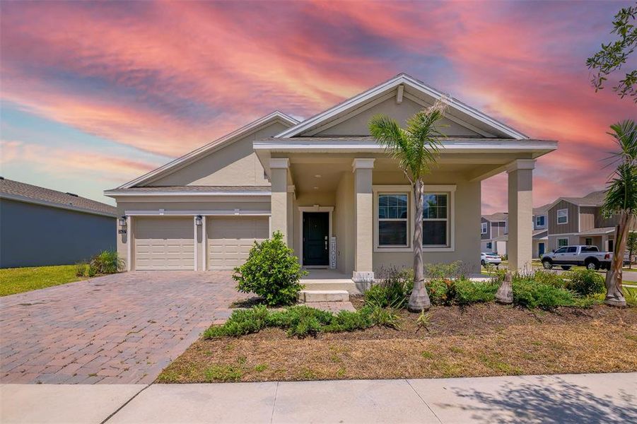 Front exterior of a new home in Tohoqua, Kissimmee, FL, highlighting curb appeal (Image 24). Front exterior of a new home in Tohoqua, Kissimmee, FL, highlighting curb appeal (Image 24).