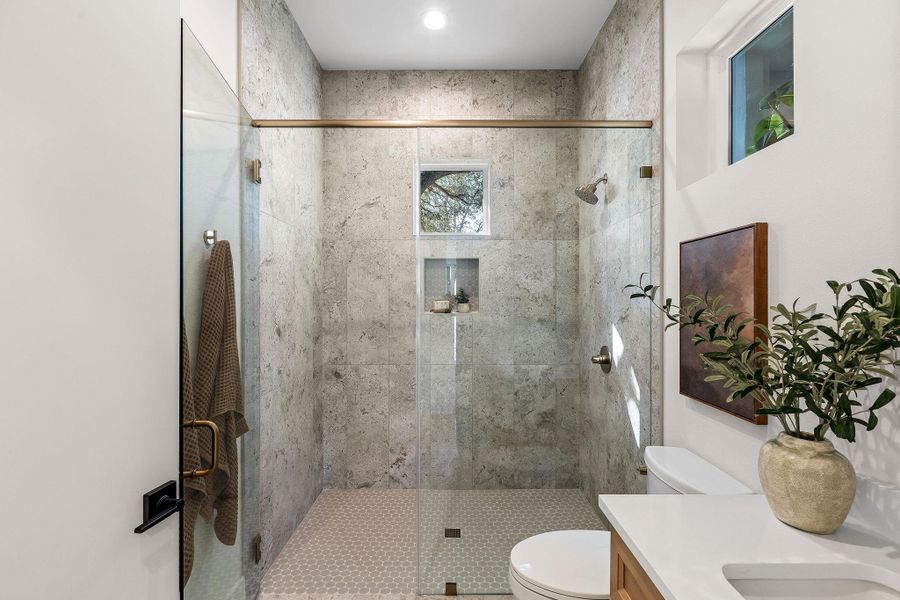 Full bathroom featuring vanity and a stall shower