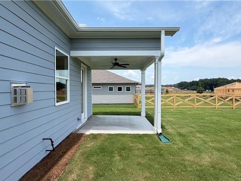 Exterior details and patio area of a home in Wehunt Meadows, Hoschton (Image 4).