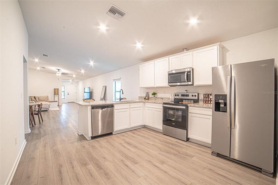 Furnished interior view inside a new home in The Crossing at Palm River, Tampa (Image 15).